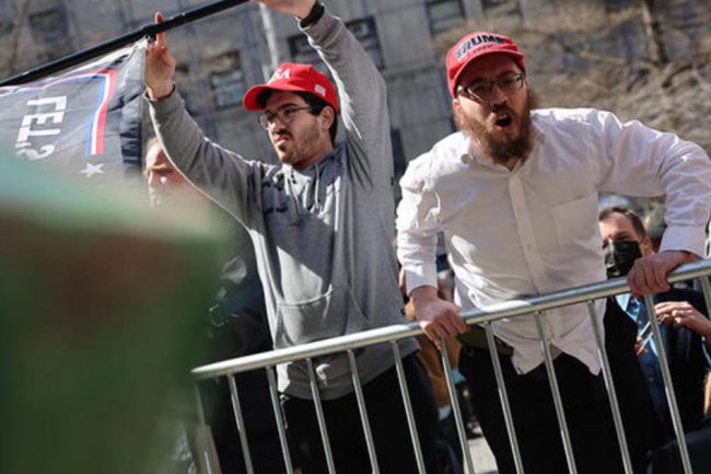 "Small, but loud" group of Trump supporters demonstrates in New York as former president charged