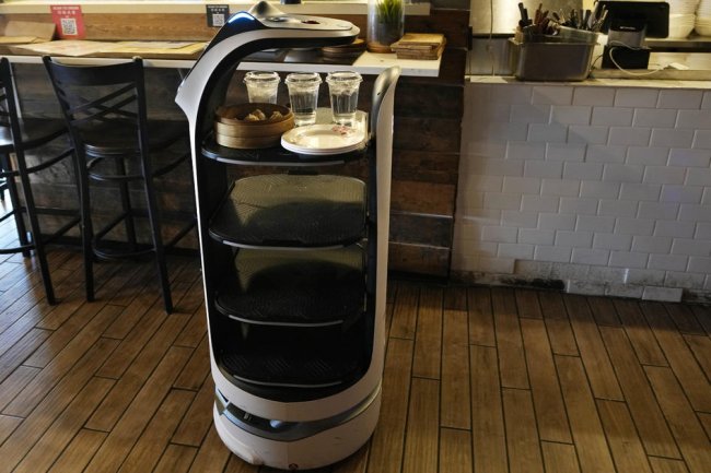 Are robot waiters coming to a restaurant near you?