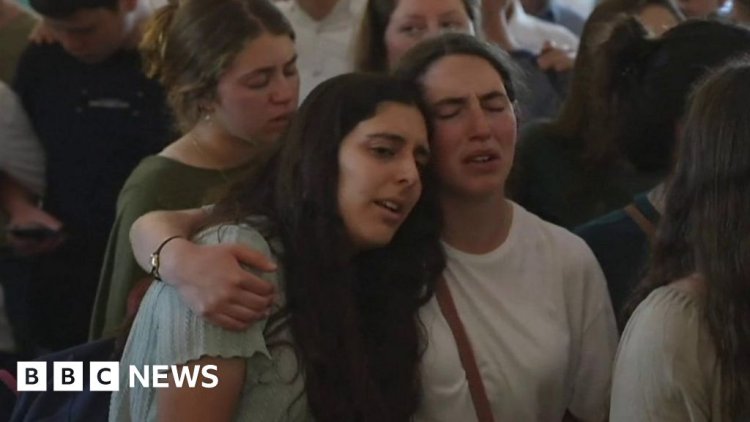 Songs of grief at funeral for sisters killed in occupied West Bank