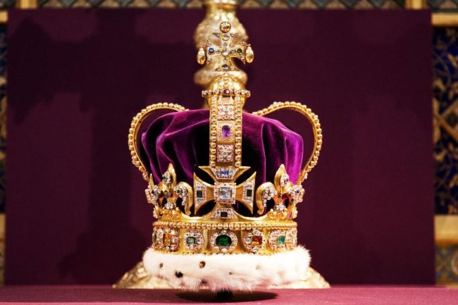 What To Know About St. Edward’s Crown—And The Controversies Behind The Royal Jewels On Display During King Charles’ Coronation