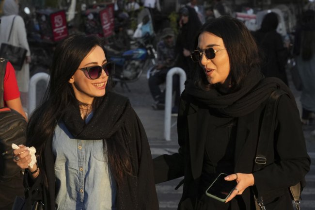 As more women forgo the hijab, Iran's government pushes back