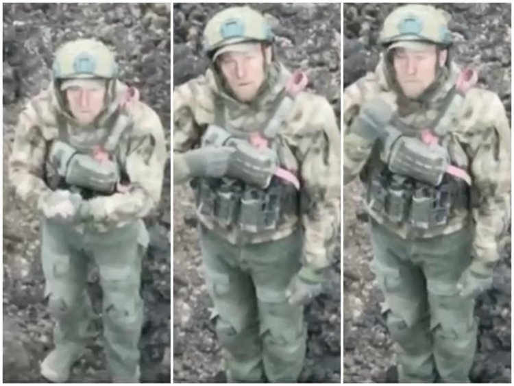 Dramatic video shows a Russian soldier being shot at by his own side as he tries to surrender to a drone, Ukrainian official says