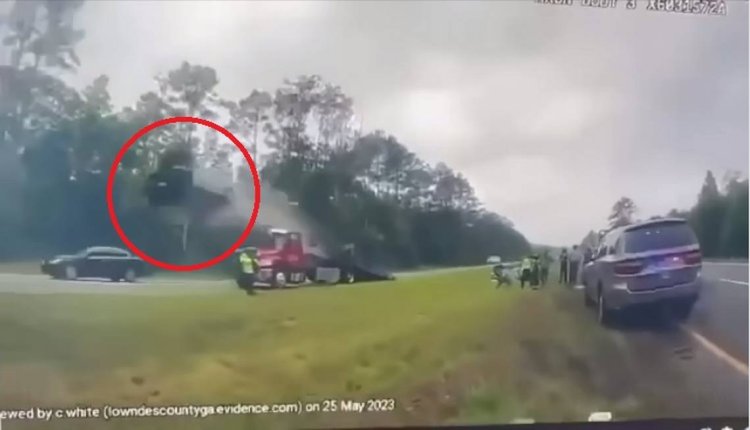 Car slams into tow truck ramp and flips 120 feet in air on Georgia highway, video shows