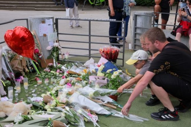 Toddlers stable after Annecy attack, France lauds 'backpack hero'