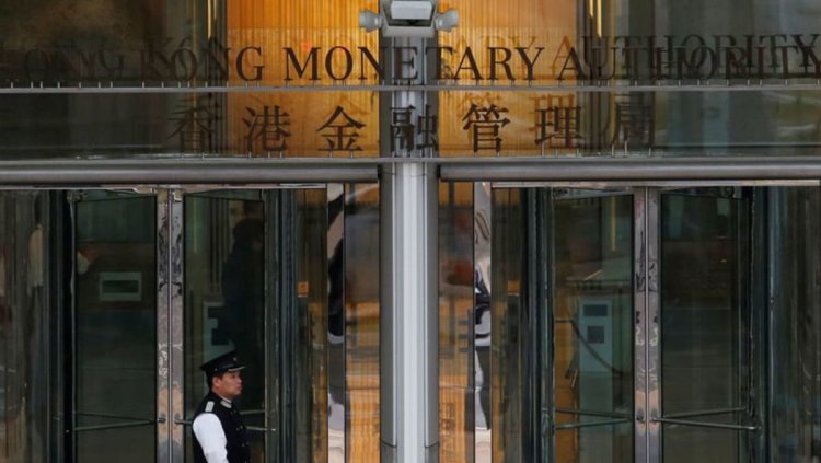 Hong Kong central bank leaves interest rates unchanged, tracking Fed move