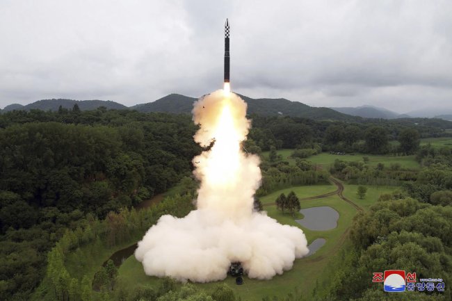 Kim vows to boost North Korea's nuclear capability after observing new ICBM launch