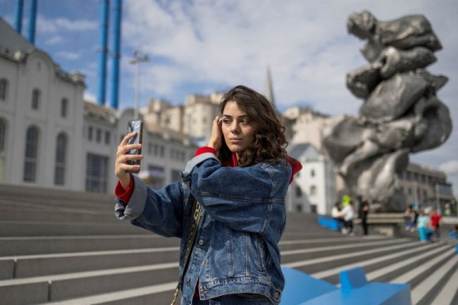 ‘We carry on’: How Russia’s youth see their lives and their future