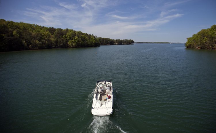 Usher's ex-wife wants to drain Georgia's largest lake, where a boater fatally struck her son