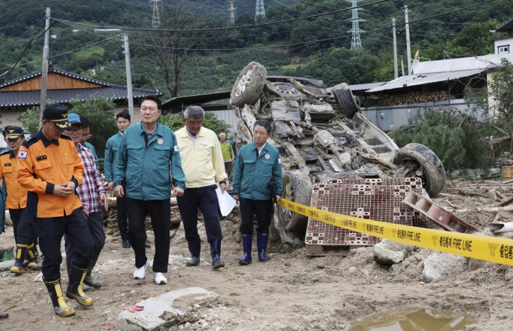 South Korea's death toll from destructive rainstorm grows to 40 as workers search for survivors
