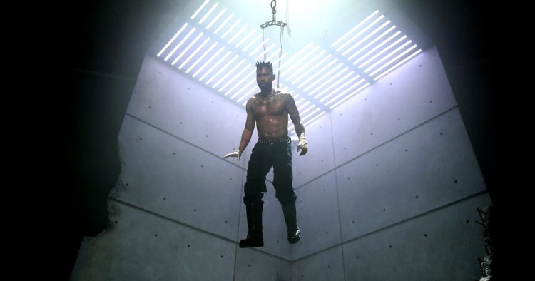 What?! Miguel Performs While Suspended By Hooks in Back Piercing