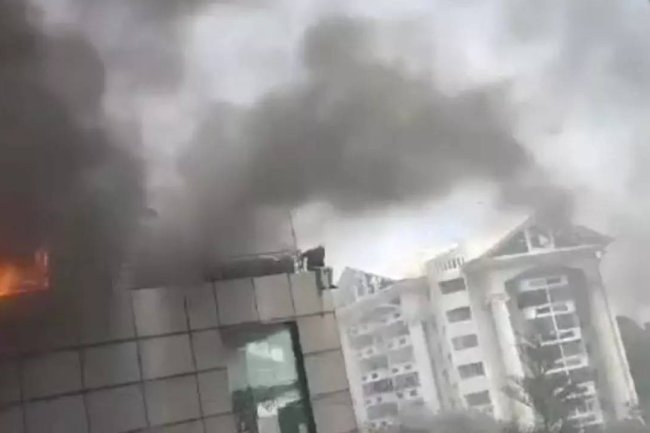 Photos: Man jumps off burning building in Bengaluru