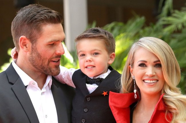 Carrie Underwood and Mike Fisher’s Sweetest Family Moments With 2 Sons