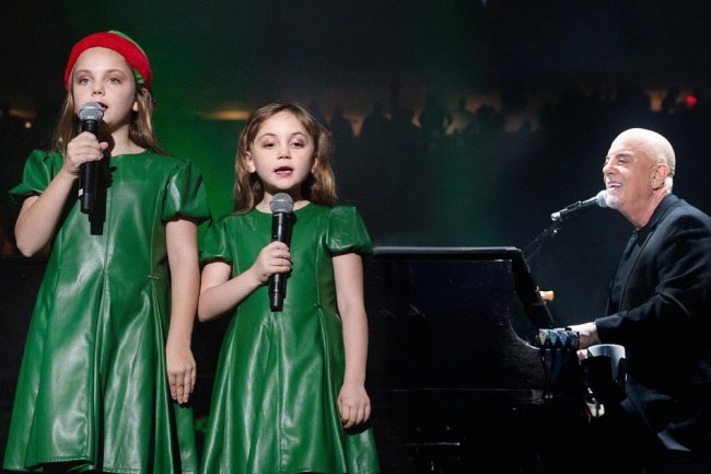 Billy Joel Brings Out Daughters for 'Jingle Bells' Performance at MSG