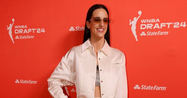 Caitlin Clark Makes Fashion History Dressed in Prada at WNBA Draft